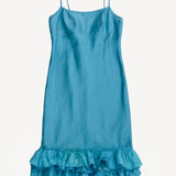 Front view of livadi slip with ruffles on white background, with no model shown.