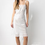 Front view of tint susan slip on model, against a white background.
