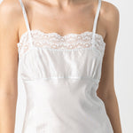 Front closeup view of tint susan slip on model, against a white background.