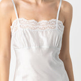 Front closeup view of tint susan slip on model, against a white background.