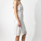 Alternate side closeup of tint susan slip on model, against a white background.