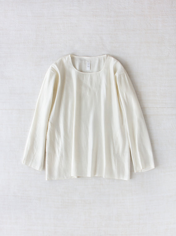 Front view of rice tunisian top on white background, with no model shown.