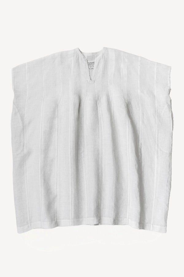 Front view of rice yoruba tunic on whiter background, with no model shown.