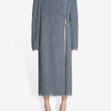 Front view of dark grey Rivla Fringed Coat on model wearing white heels, against a white background.