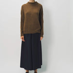 Front view of palissandro cn kimono sleeve sweater on model wearing navy pants, against a white background.