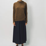 Front view of palissandro cn kimono sleeve sweater on model wearing navy pants, against a white background.