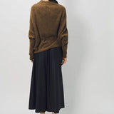 Back view of palissandro cn kimono sleeve sweater on model wearing navy pants, against a white background.