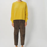 Front view of sunray ls crew neck sweater on model wearing brown pants and loafers, against a white background.
