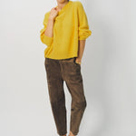 Alternate front view of sunray ls crew neck sweater on model wearing brown pants and loafers, against a white background.