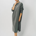 Alternate front view of storm iconic cashmere dress on model wearing loafers, against a white background.
