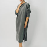 Alternate front view of storm iconic cashmere dress on model wearing loafers, against a white background.