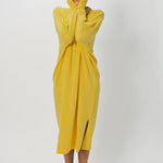 Alternate front view of sunray iconic cashmere dress on model wearing loafers, against a white background.