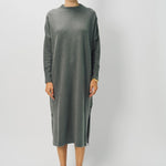 Front view of storm iconic cashmere dress on model wearing loafers, against a white background.