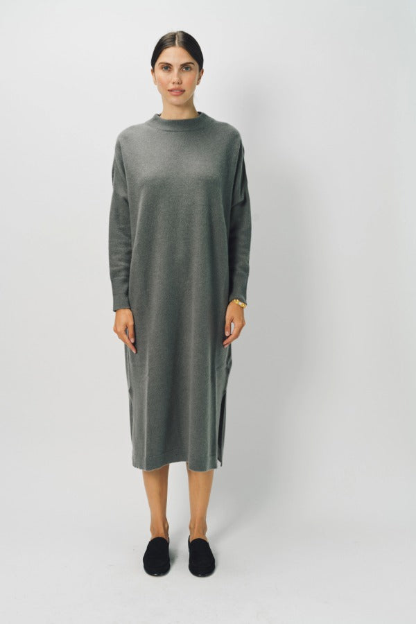 Front view of storm iconic cashmere dress on model wearing loafers, against a white background.
