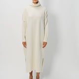 Front view of bone iconic cashmere dress on model wearing loafers, against a white background.