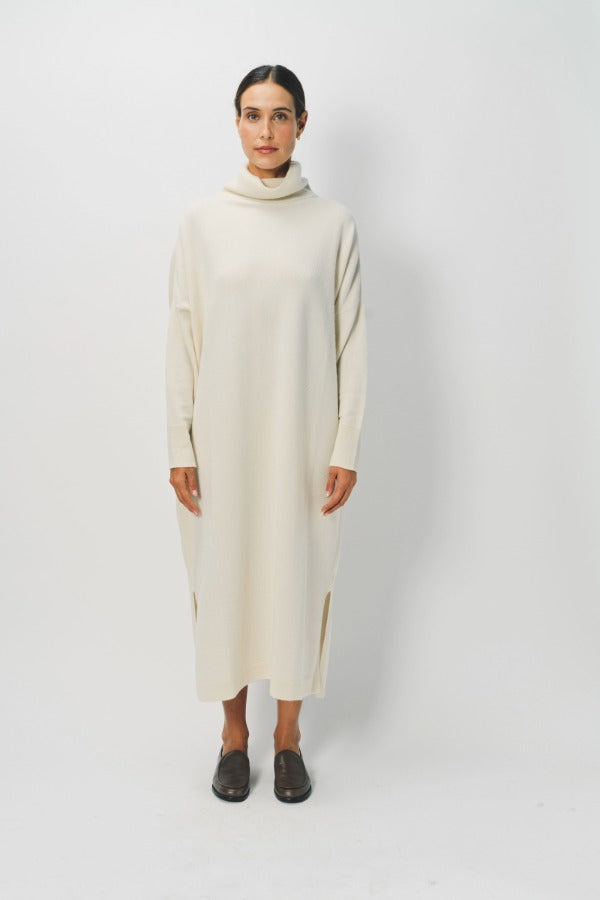 Front view of bone iconic cashmere dress on model wearing loafers, against a white background.