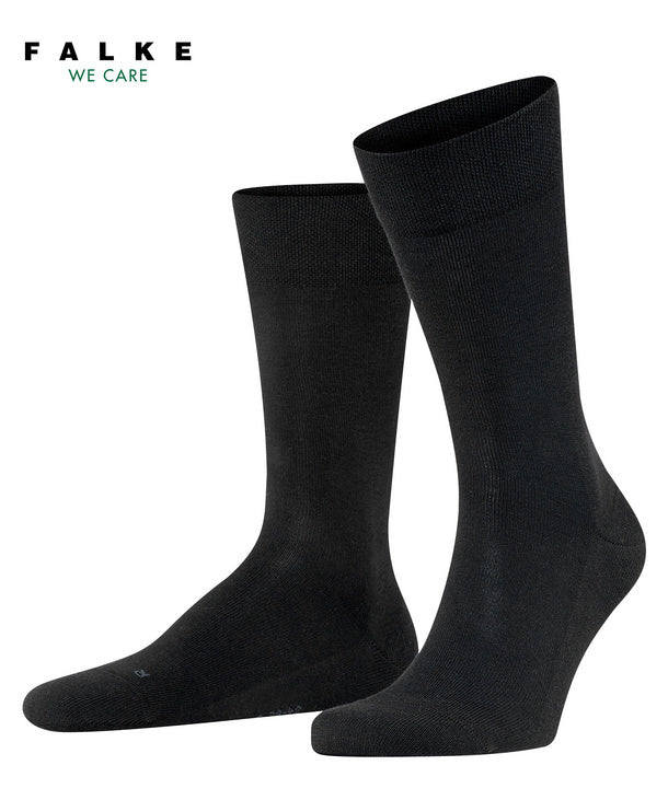 Left side pair view of black sensitive london socks on white background, with no model shown.