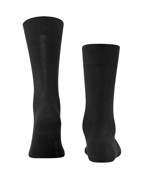 Back view of black sensitive london socks on white background, with no model shown.