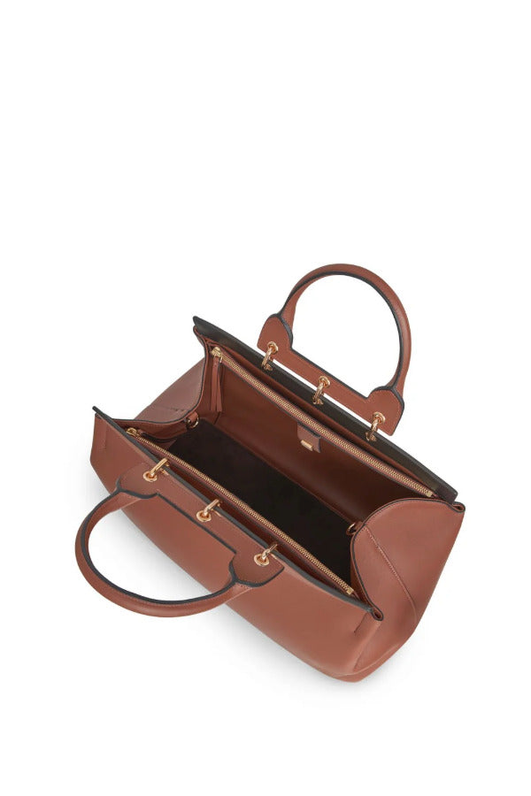 Side open view of cognac amethyst tote on white background with no model shown.