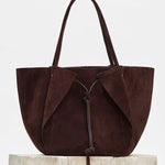 Front view of dark brown marija tote bag on white background, with no model shown.