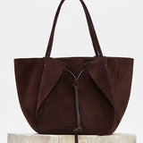 Front view of dark brown marija tote bag on white background, with no model shown.