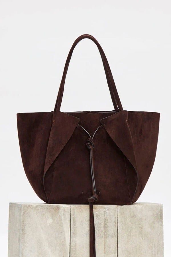 Front view of dark brown marija tote bag on white background, with no model shown.