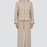 Front closed view of chantilly cape jacket on model wearing beige pants, against a white background.