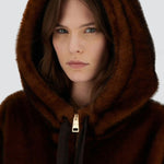 Front hood closeup of fondante knitted jacket on model, against a white background.