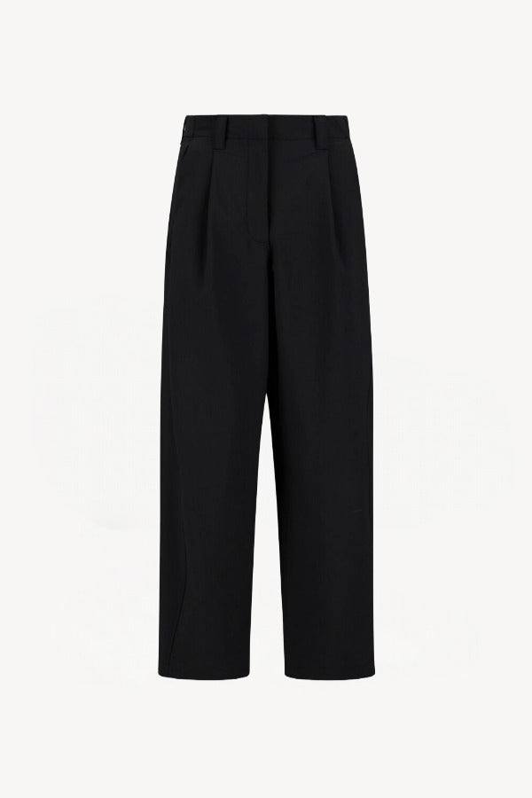 Front view of black laminar trousers on white background, with no model shown.