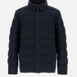 Front view of blue men's jacket on white background, with no model shown.
