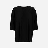 Front view of black pleated jersey t-shirt on white background, with no model shown.