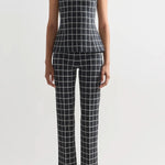 Front view of charcoal combo louis pants on model wearing inna charcoal combo top and flats, against a white backgorund.