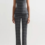 Front view of charcoal combo louis pants on model wearing inna charcoal combo top and flats, against a white backgorund.