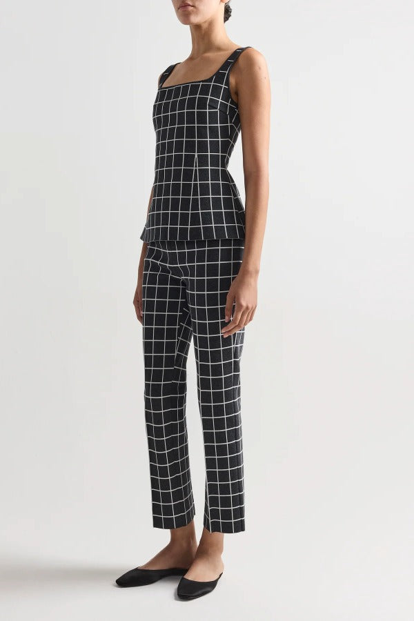 Side view of charcoal combo louis pants on model wearing charcoal combo inna top and flats, against a white background.