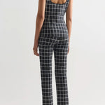 Back view of charcoal combo louis pant on model wearing charcoal combo inna top with flats, against a white background.
