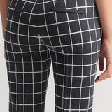 Back closeup view of charcoal combo louis pants on model, against a white background.