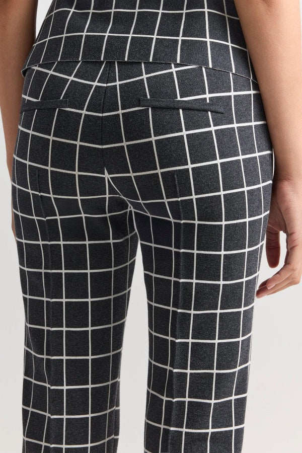 Back closeup view of charcoal combo louis pants on model, against a white background.