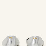 Back view of silver ballerina flats on white background with no model shown.
