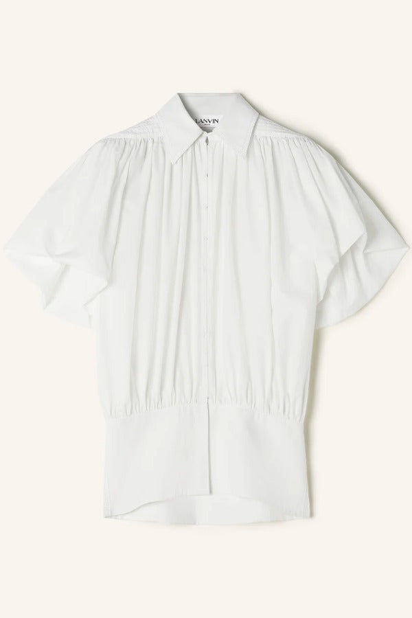 Front view of cloth puffy sleeves top on white background, with no model shown.