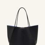 Back view of black tote bag on white background, with no model shown.
