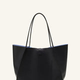 Back view of black tote bag on white background, with no model shown.