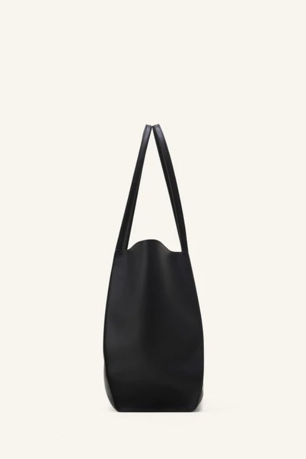 Alternate side view of black tote bag on white background, with no model shown.