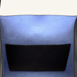 Open view of black tote bag on white background, with no model shown.