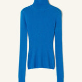Front closeup view of electric blue turtleneck jumper on  white background, with no model shown.
