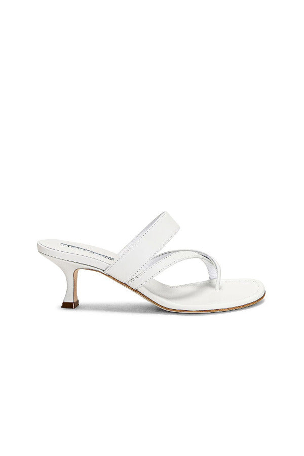 Right side view of white susa 50 mules on white background, with no model shown.