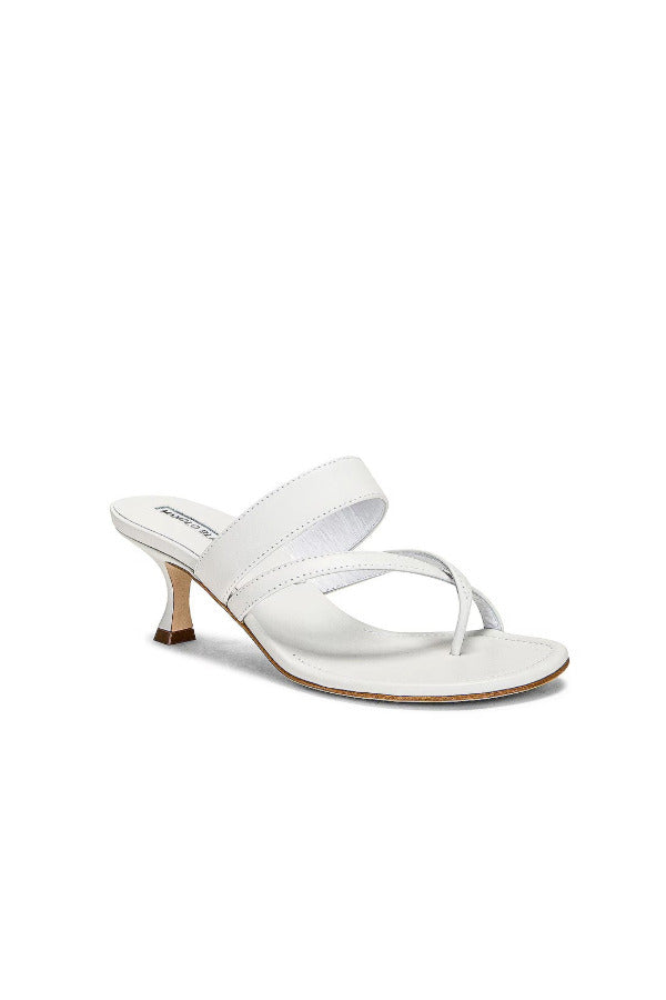 Front slanted view of white susa 50 mules on white background, with no model shown.