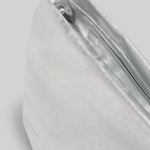Zipper view of arenite fanta shoulder bag on white background, with no model shown.
