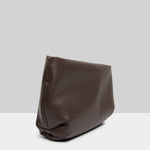 Side view of morro fanta shoulder bag on white background, with no model shown.