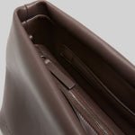 Zipper view of morro fanta shoulder bag on white background, with no model shown.