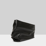 Side view of nero fanta shoulder bag on white background, with no model shown.